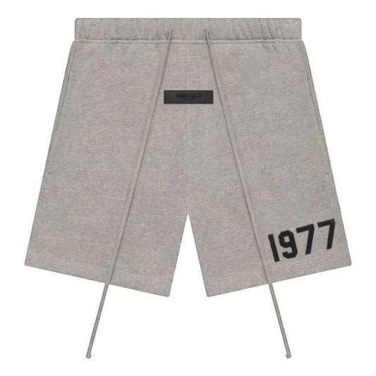 Verified Vault Dark Oatmeal sweatshorts with "1977" graphic print and rubberized brand patch. Cotton-rich jersey.