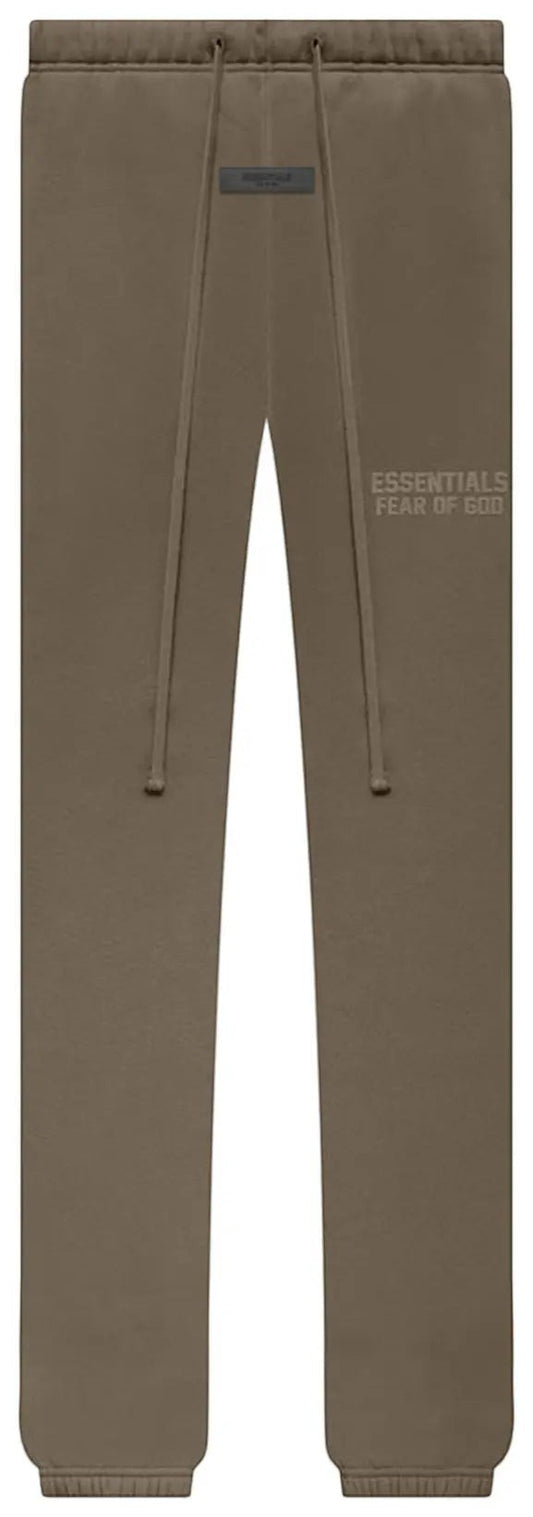 Verified Vault Fear of God Essentials sweatpant in muted pale brown. Cotton-blend fleece with relaxed fit, tapered leg, drawstring, rubber logo, and elastic cuffs.